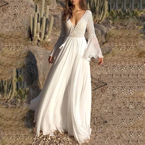 Bohemian beige dress with fringe jacket and ankle boots