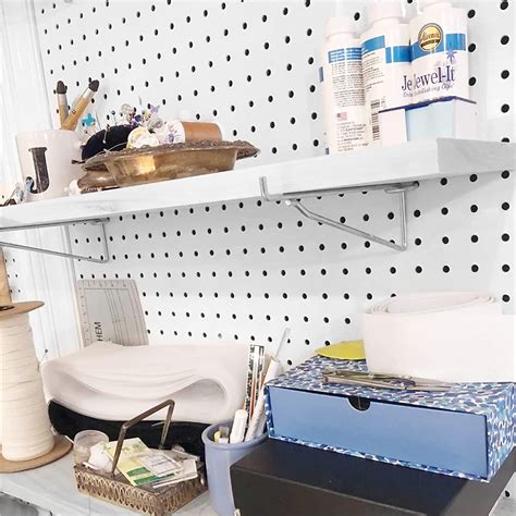 Peg board shelves in a workshop