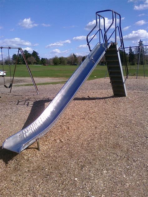 Kids playing on a sliding board